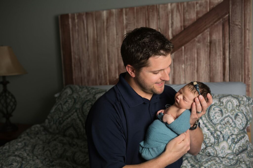 newborn with dad at home in San Antonio, Texas