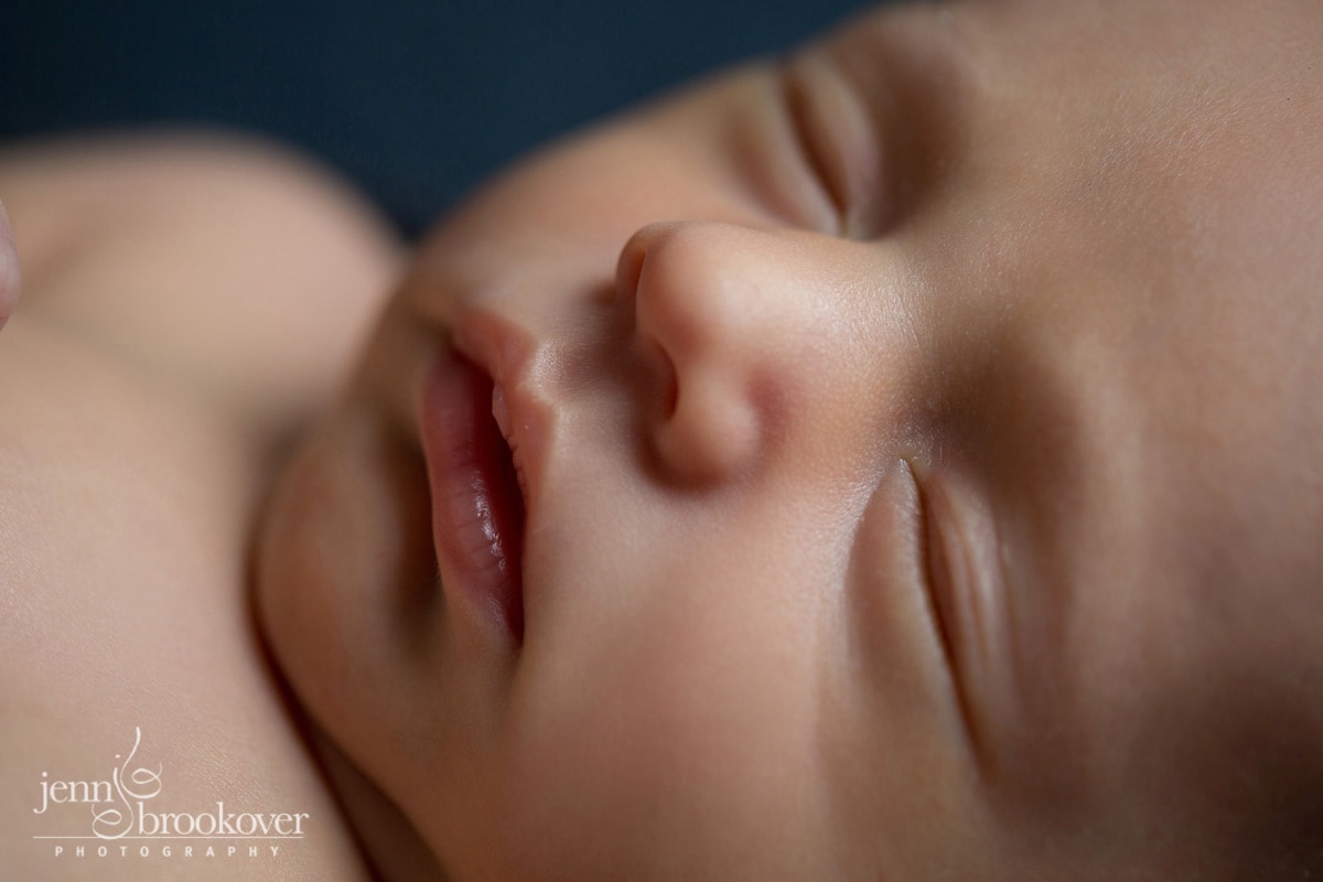 macro image of a newborn boy focusing on lips and nose taken by Jenn Brookover Photography in San Antonio