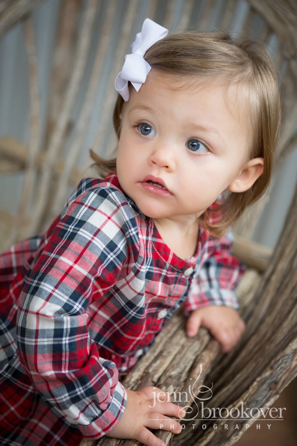 baby girl during her family portraits at Tejas Rodeo