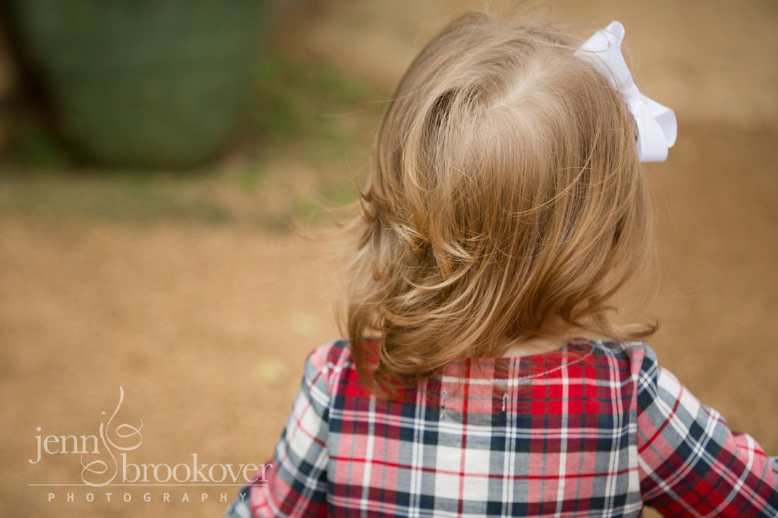 back of little girl's head taken at Tejas Rodeo during photo session