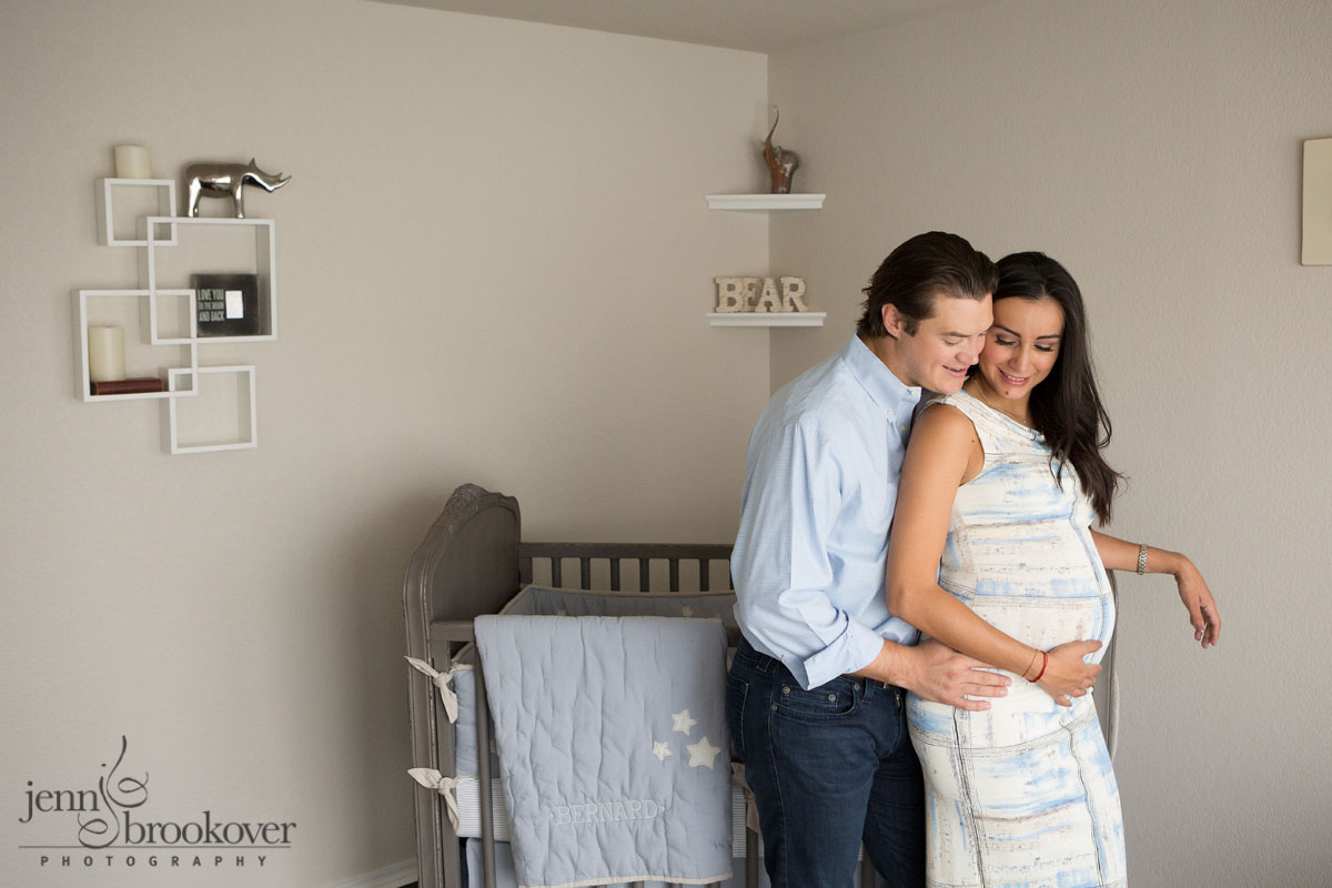 couple in nursery during maternity session at home