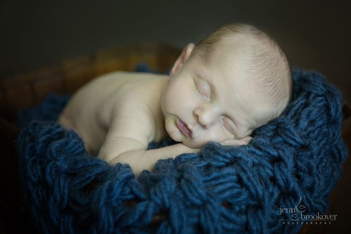 close up of newborn at home during photo session 
