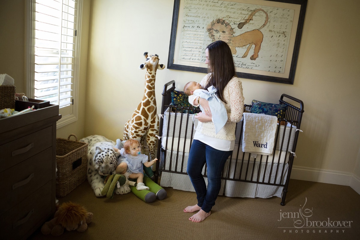 newborn family at home in nursery with toddler and newborn