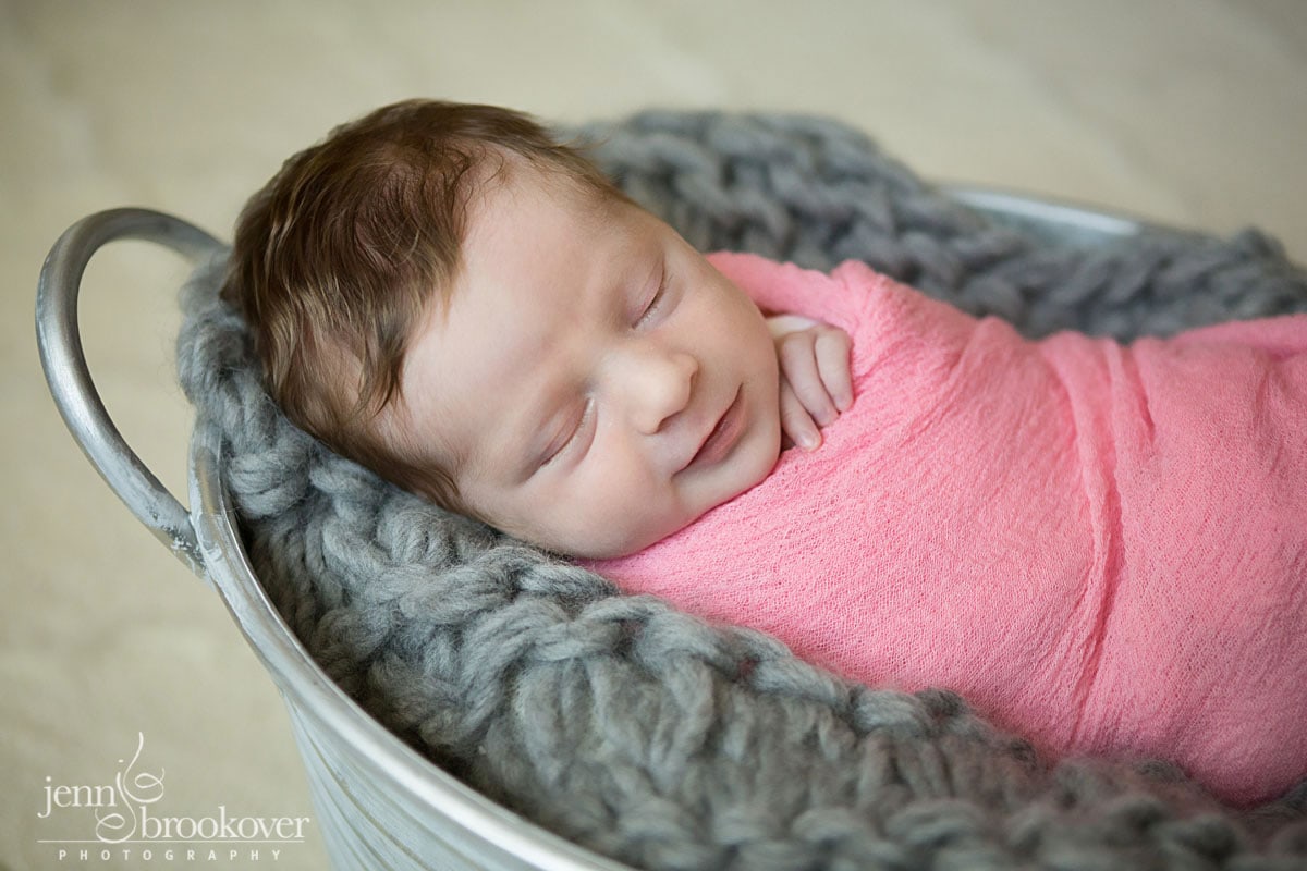 newborn photography at home in San Antonio, Texas, baby smiling