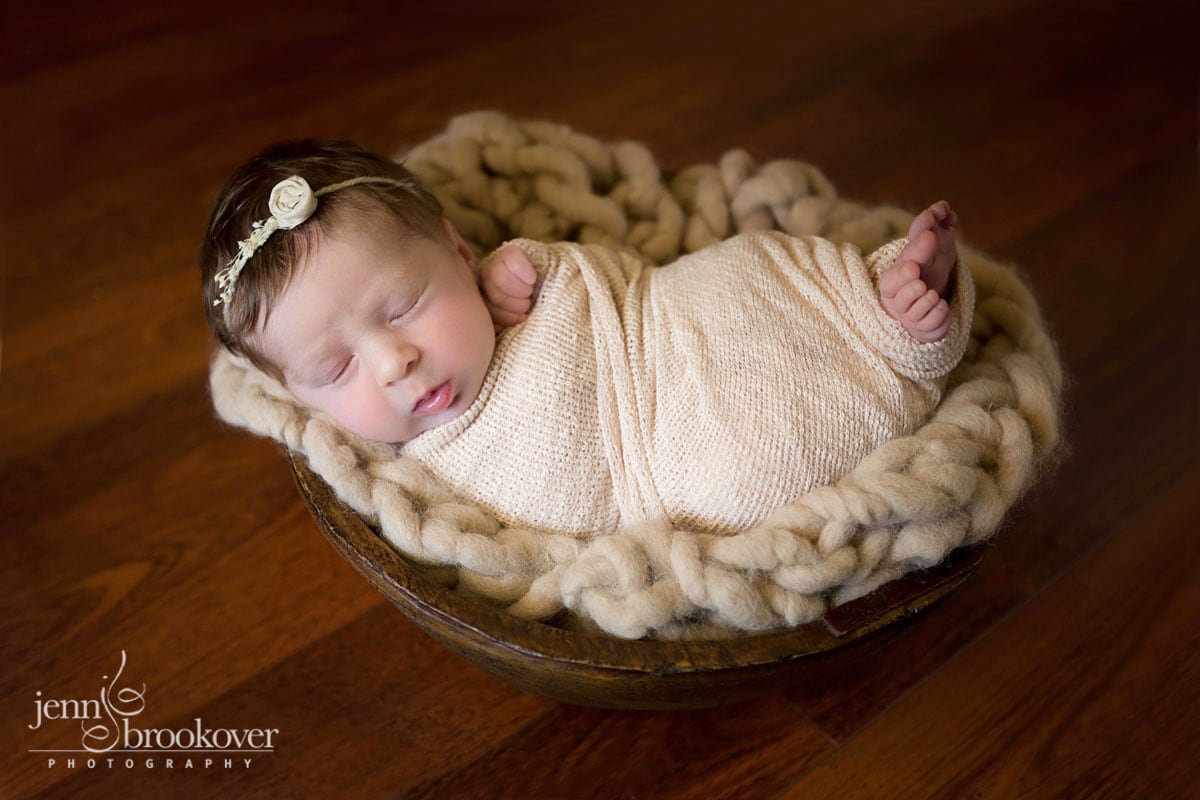 newborn baby photo shown on 'about me' page, taken by Jenn Brookover