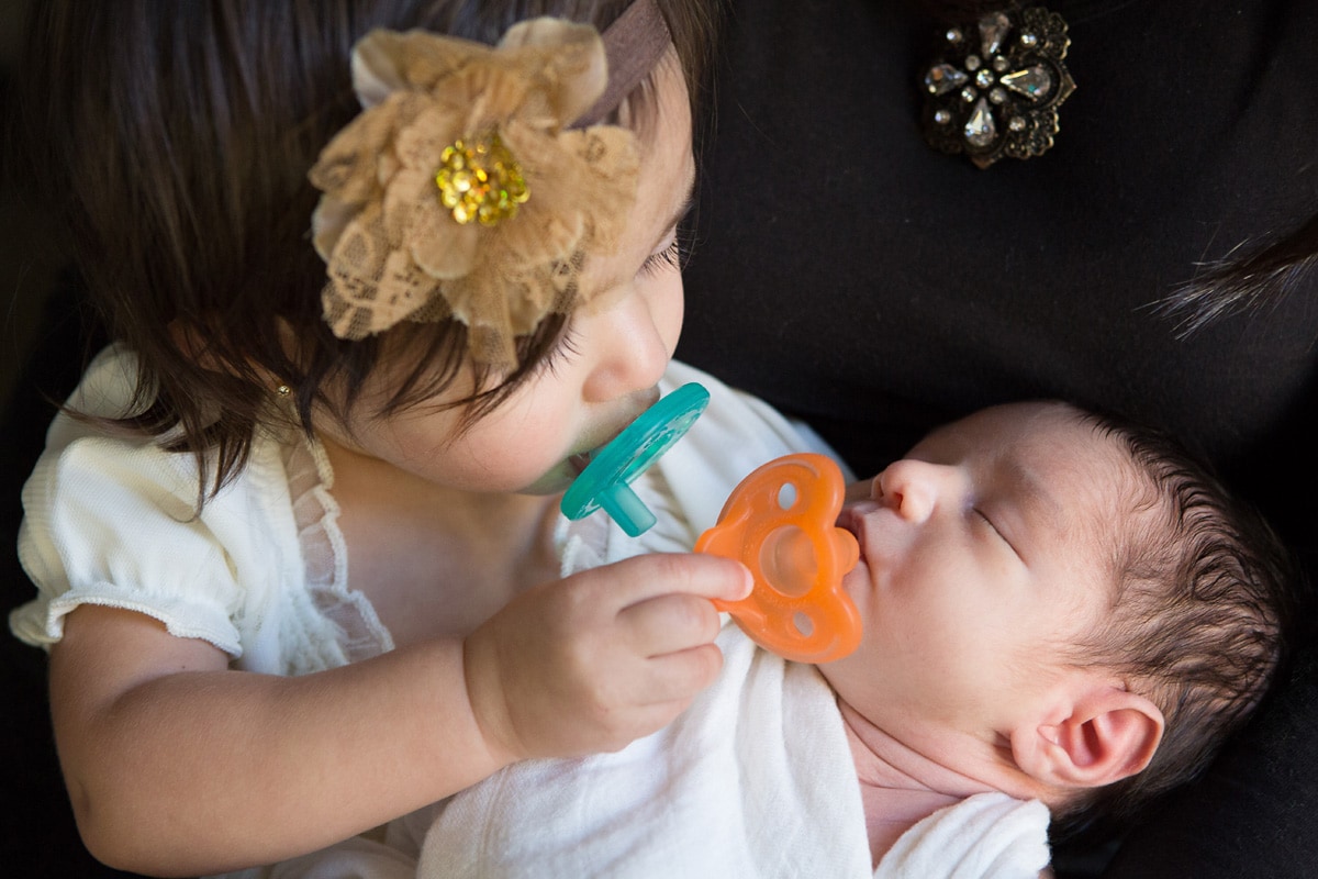 toddler and newborn captured by Jenn Brookover Newborn Photographer San Antonio