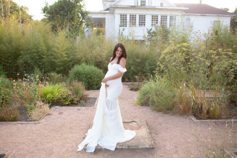pregnant mom in gown at Landa Library, Alamo Heights during her maternity photo shoot with Jenn Brookover Photography