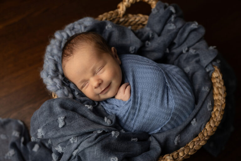 baby boy smiling during newborn session at home in Alamo Heights, San Antonio, Texas by Jenn Brookover Photography